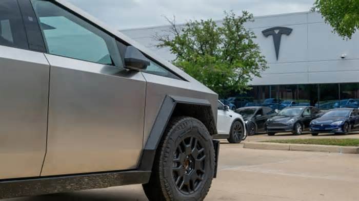 Tesla stock slips after report EV maker is pausing Cybertruck and Model Y production
