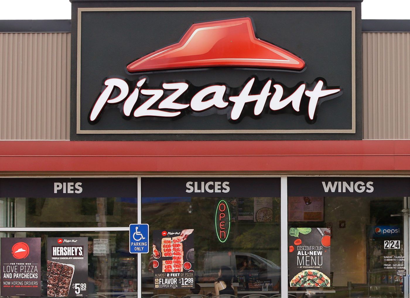 Ticker: Pizza Hut’s parent company says it’s considering selling the chain; Big Tesla investor will vote against Musk’s massive pay package