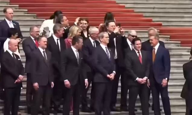 Elon Musk becomes instant viral hit in China after taking 360-degree tourist photo while posing with fellow tech billionaires during Trump state visit