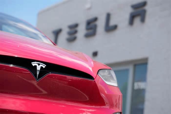 Tesla shares open higher after Thursday’s rout