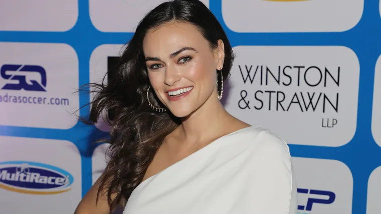 Flawless ‘SI’ Swim model stuns on the frontier in chaps, string bikini