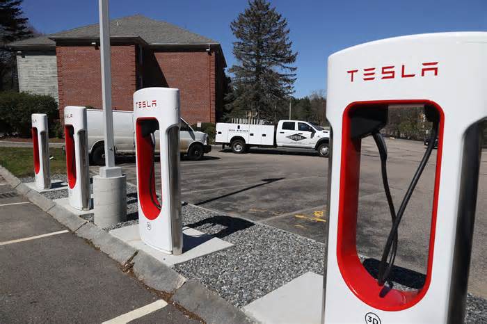 How a Tesla EV charging station ended up next to a shelter for migrant children