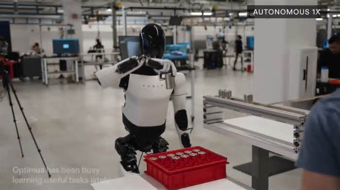 Watch Tesla’s Humanoid Second-gen Optimus Robot Work with Batteries in the Factory