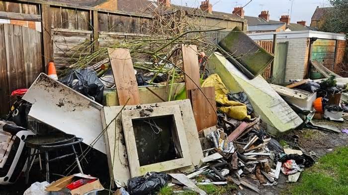 Heartless fly-tippers dump three TONNES of rubbish outside terminally ill grandfather's home - making ambulance access impossible